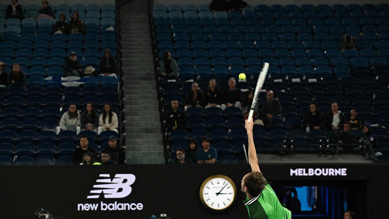 A largely empty arena watched the contest unfold. (Photo by Anthony WALLACE / AFP)