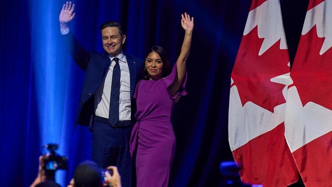 Canada’s Conservative leader Pierre Poilievre and his wife Anaida wave to the crowd at the Conservative election party in Ottawa. Picture: AFP