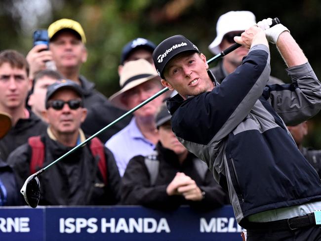 Ryggs Johnston of the US tees off during the third round of the 2024 ISPS Handa Australian Open Golf tournament at the Kingston Heath Golf Club in Melbourne on November 30, 2024. Picture: AFP