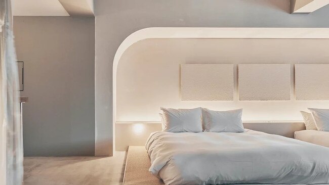 The curved walls help shape the lighting in all rooms.