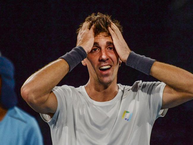 Thanasi Kokkinakis of Australia reacts after winning against Arthur Rinderknech of France in the men's singles final match at Adelaide International ATP 250 tennis tournament in Adelaide on January 15, 2022. (Photo by Brenton Edwards / AFP)