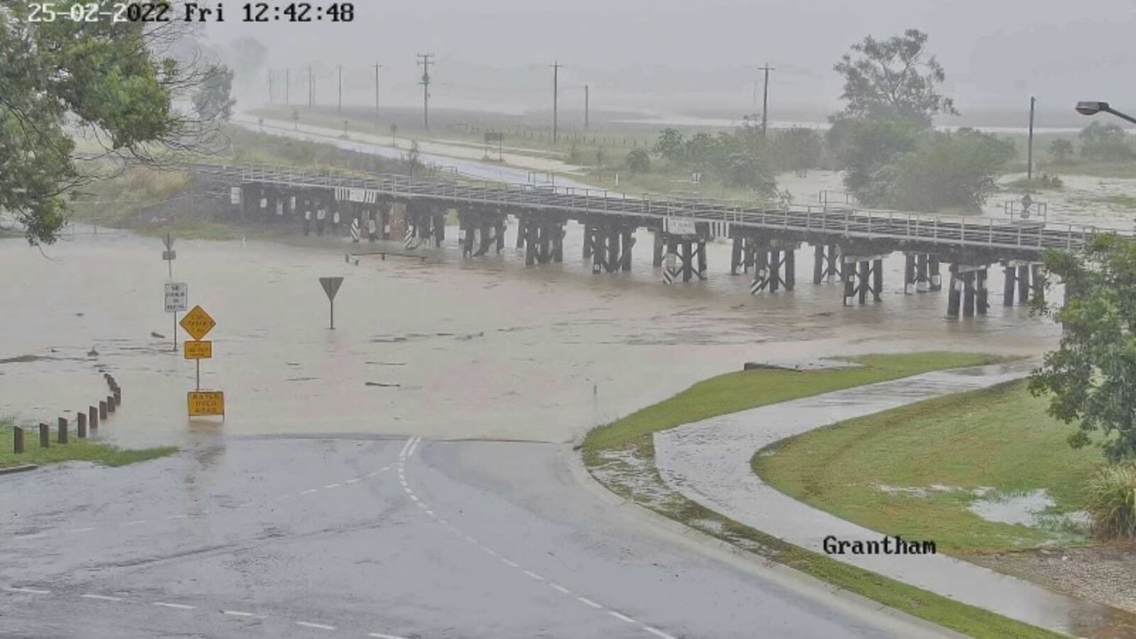 Floodwaters have reached the the railway bridge in Grantham, Lockyer Valley.