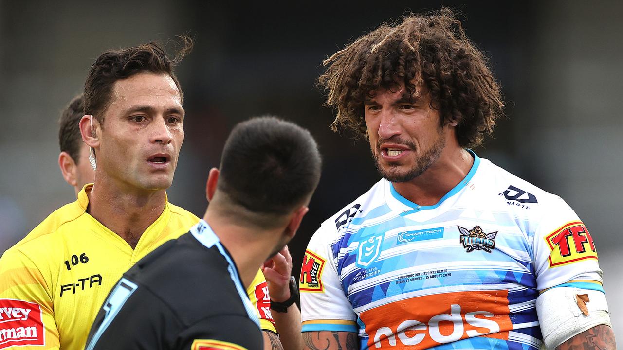 Titans' Kevin Proctor and Cronulla's Shaun Johnson come together after Johnson was bitten by Proctor.