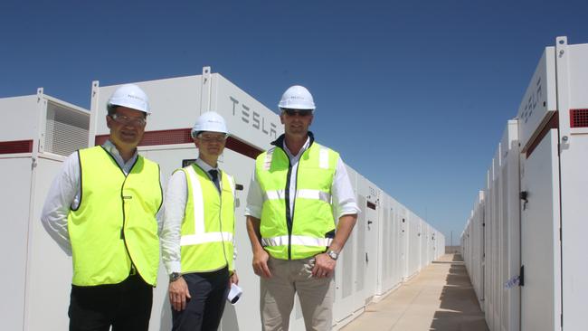 Tesla managing director energy products Mark Twidell, Neoen head of development Garth Heron and then SA Energy Minister Dan van Holst Pellekaan at the Hornsdale Power Reserve expansion in February, 2020. Picture: Chris Russell