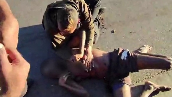 The footage shows bystanders helping the man stabbed. Picture: File