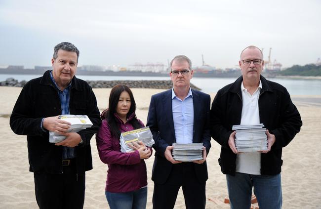 Maroubra MP Michael Daley MP has collected more than 4,000 signatures against the Botany Bay cruise plan. Pictured from left, Councillor Danny Said, Leanne Ooi, from the Save the Coalition, Mr Daley, and Bill Burst from the Save the Bay Coalition. Picture: Ben James