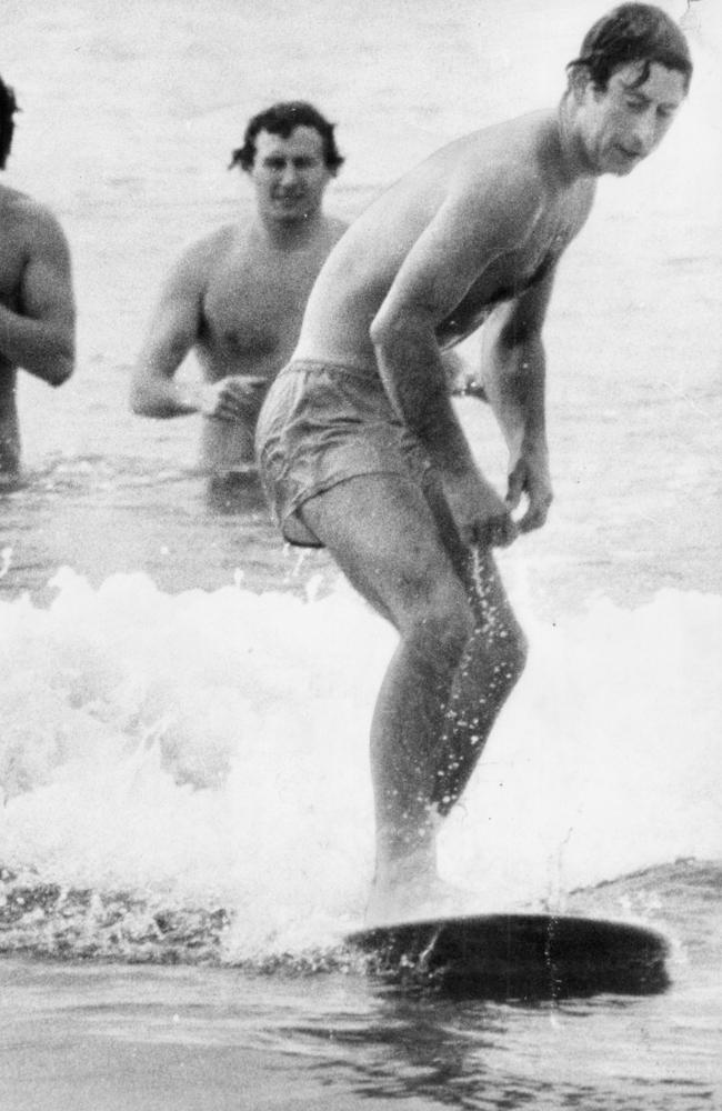 Prince Charles catches a wave at Bondi on November 5, 1977 during his Australian Tour. Photo: Barrie Stark.