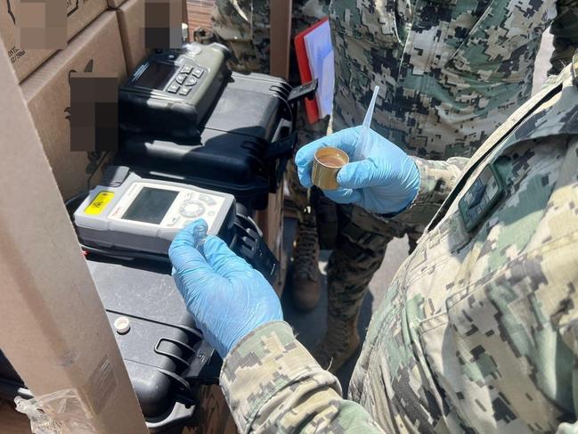 A photo released by the Mexican Navy shows boxes of liquid meth concealed in bottles of tequila, seized at the port of Manzanillo. Picture: SECRETARÍA DE MARINA/SEMAR