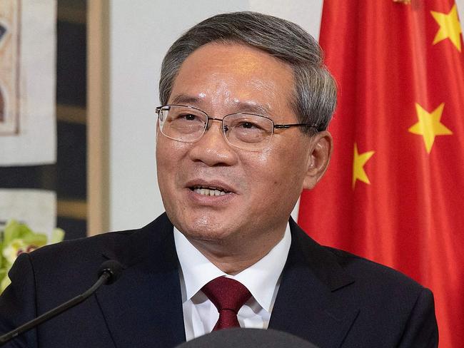 China's Premier Li Qiang speaks during a joint press conference with New Zealand's Prime Minister Christopher Luxon (not pictured) a joint press conference at Government House in Wellington on June 13, 2024. (Photo by Marty MELVILLE / AFP)