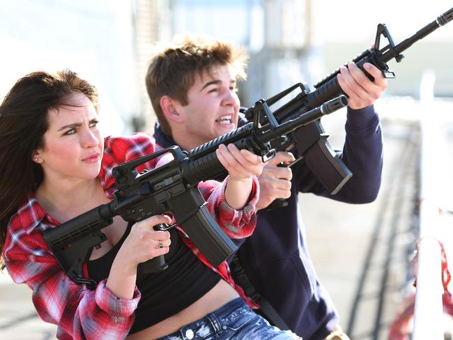 Ryan Newman as Claudia Shepard, left, and Jack Griffo as Billy appear in a scene from Sharknado 3: Oh Hell No! Picture: Raymond Liu/Syfy via AP