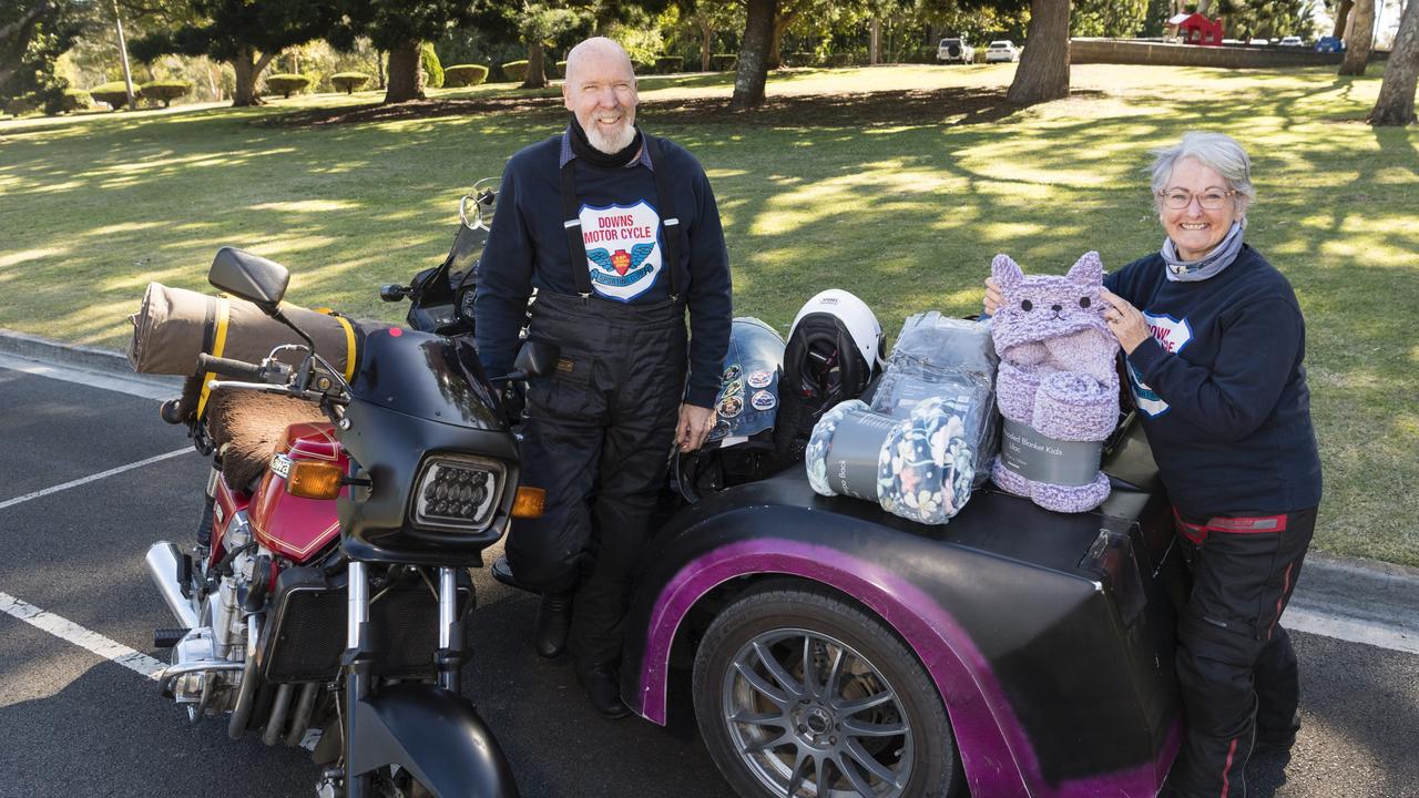 Steve and Con Harriman with their donation on the Huggie Bear Memorial Toowoomba Blanket Run organised by Downs Motorcycle Sporting Club. Picture: Kevin Farmer