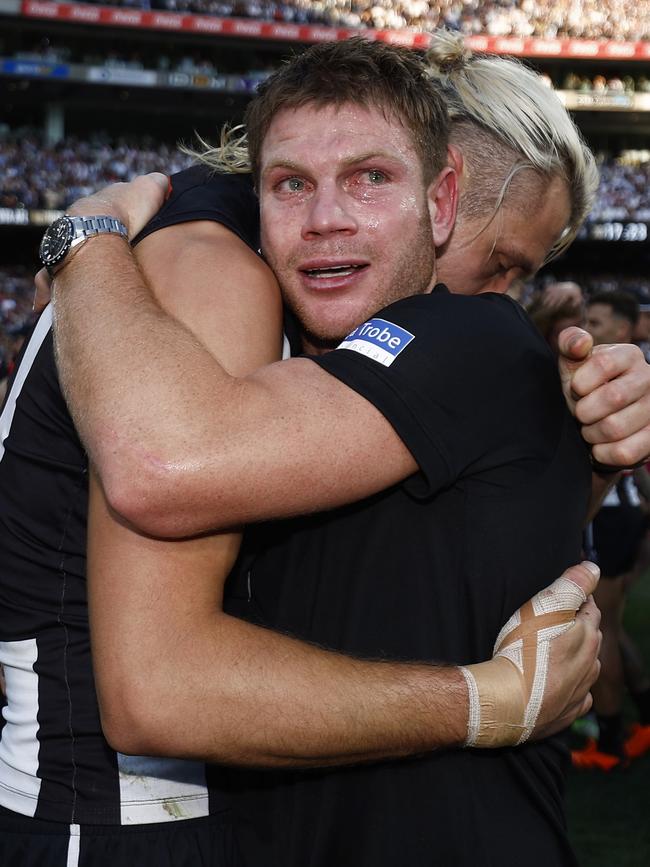 Adams and Darcy Moore after Collingwood’s grand final win last year. Picture: Daniel Pockett/AFL Photos