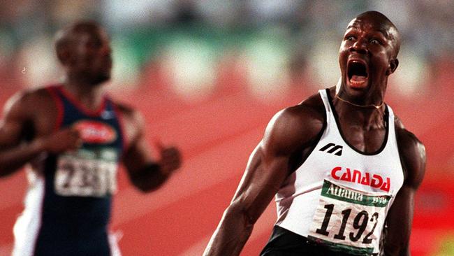 Canadian Donovan Bailey celebrates gold at Atlanta.