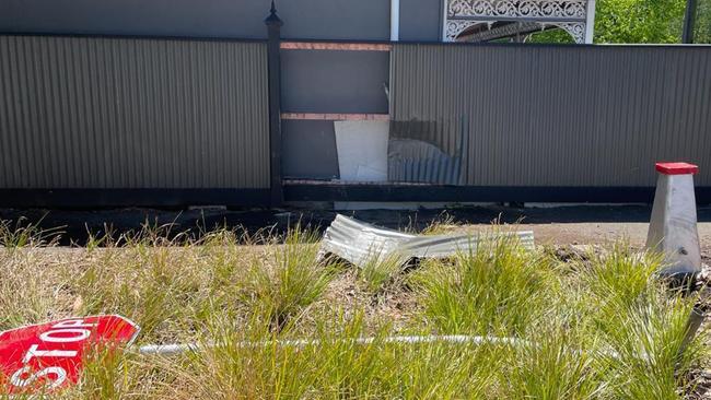 A toppled stop sign at the scene.