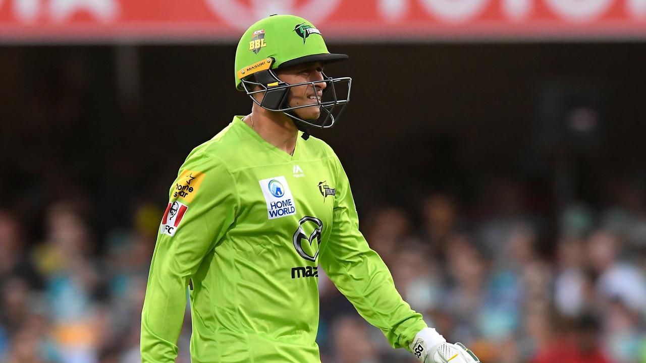 Usman Khawaja of the Thunder walks off the field after being caught out during the Big Bash League (BBL) cricket match between the Brisbane Heat and the Sydney Thunder at the Gabba in Brisbane, Tuesday, December 17, 2019. (AAP Image/Albert Perez) NO ARCHIVING, EDITORIAL USE ONLY, IMAGES TO BE USED FOR NEWS REPORTING PURPOSES ONLY, NO COMMERCIAL USE WHATSOEVER, NO USE IN BOOKS WITHOUT PRIOR WRITTEN CONSENT FROM AAP