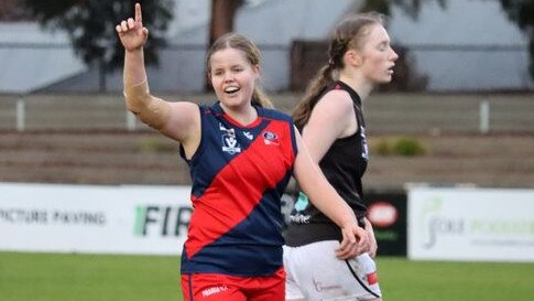 Tegan Brett celebrates a goal for Coburg. Picture: Dan Atamian