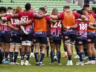 MELBOURNE, AUSTRALIA - MAY 07: The Rebels huddle before the round 11 Super Rugby Pacific match between Melbourne Rebels and ACT Brumbies at AAMI Park, on May 07, 2023, in Melbourne, Australia. (Photo by Daniel Pockett/Getty Images)