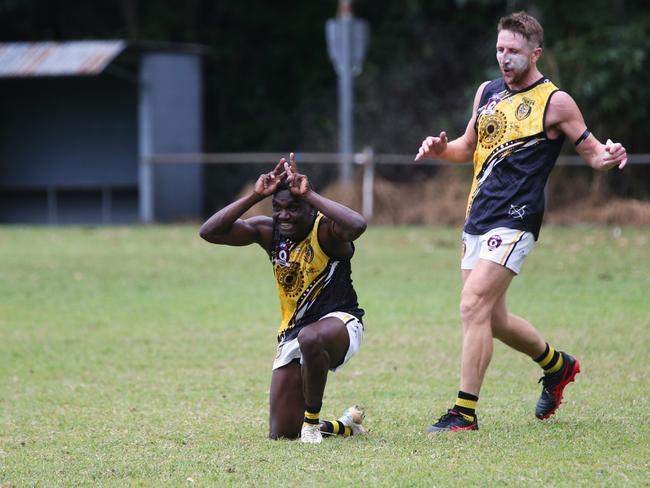 Pictured: Tigers forward Fitzroy Greenwool celebrates with Darcy Keast. Cairns City Lions v North Cairns Tigers at Holloways Beach. Dreamtime by the Sea. AFL Cairns 2024. Photo: Gyan-Reece Rocha