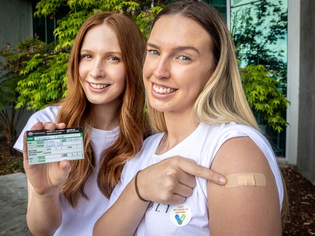 Imogen Clark and Izzy Tipper brought their Pfizer dose forward three weeks in a bid to get fully vaccinated quicker. Picture: Jake Nowakowski