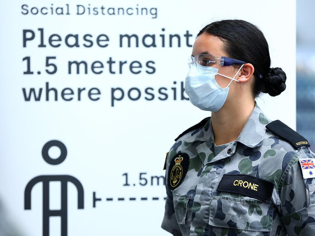 An ADF member awaiting arrivals at Perth Airport back in November 2020. Picture: Paul Kane/Getty Images