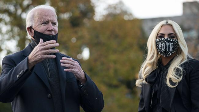 Democratic presidential nominee Joe Biden meets Lady Gaga and college students at Schenley Park in Pittsburgh, Pennsylvania yesterday. Picture: AFP