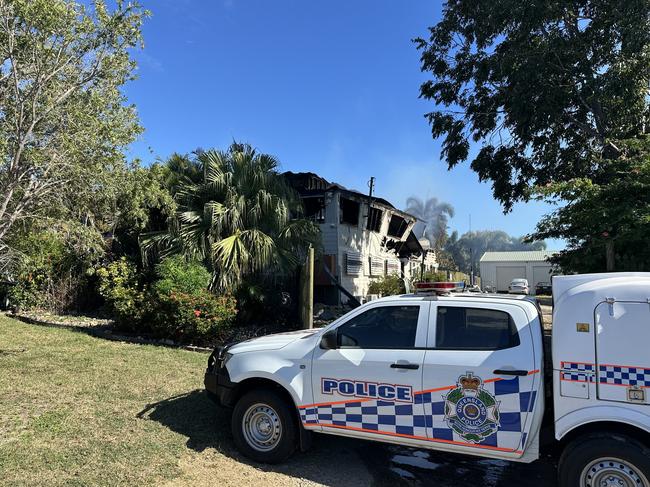 Police set up a crime scene at Barnacles Backpackers in Bowen after a fire engulfed the building, April 30, 2025