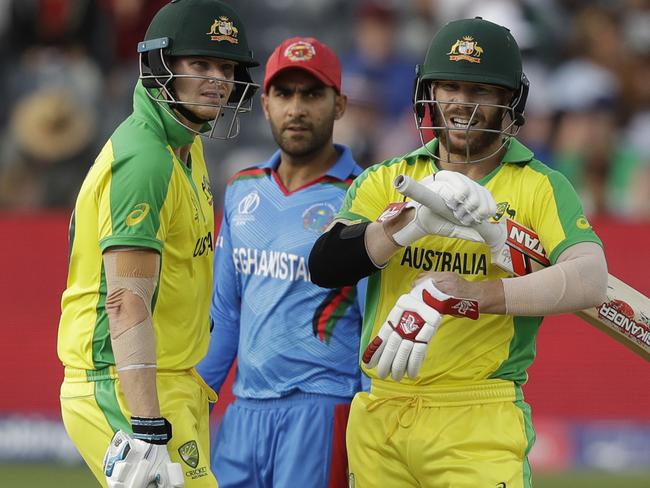 Candidate for The Voice? Steve Smith, with David Warner (right), apparently fancies himself with the guitar.