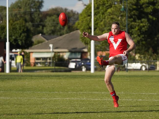 Daniel Gordon (East Brighton) kicks for goal. Picture: Valeriu Campan