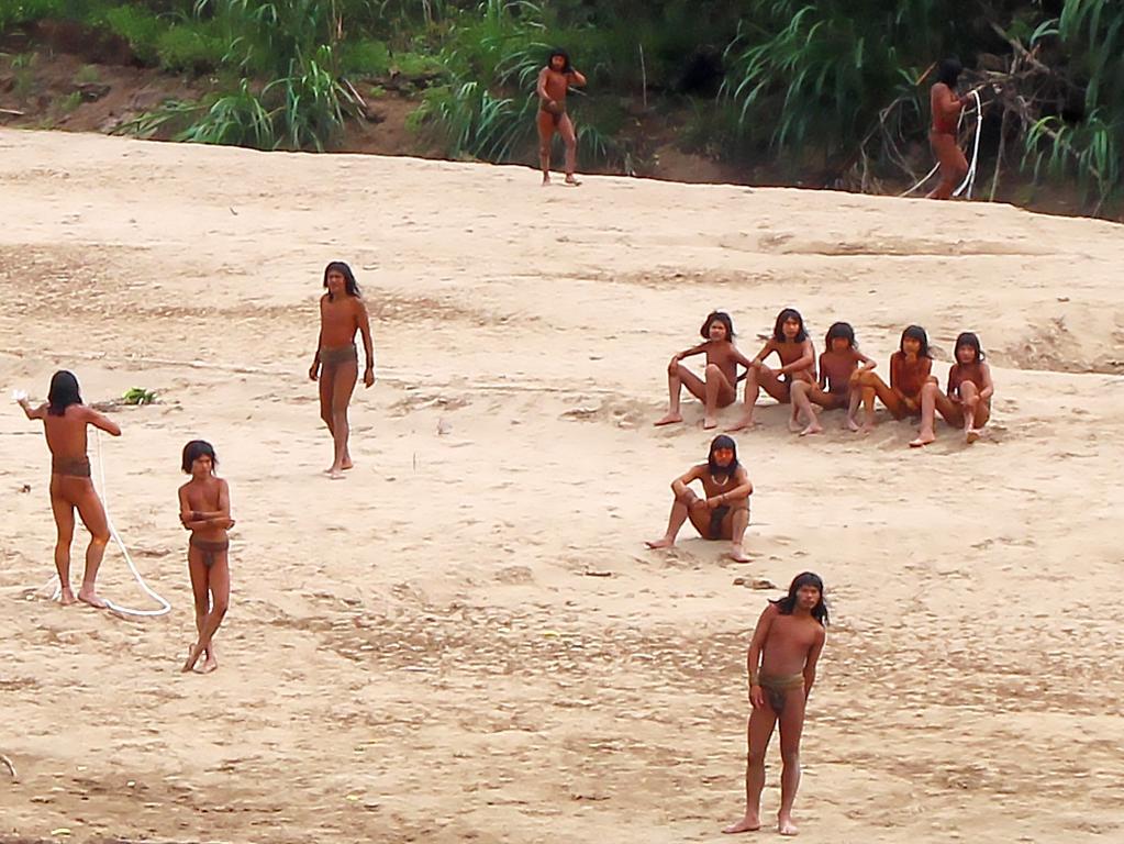 The tribe has been seen coming out of the rainforest more frequently in search of food. Picture: Survival International