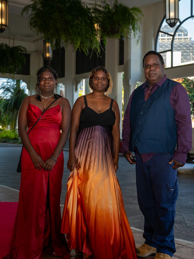 Simona Sandy, Elisha Sandy and Edgar Sandy arrive at the Pullman International for the Djarrugun College formal. Picture: Emily Barker.