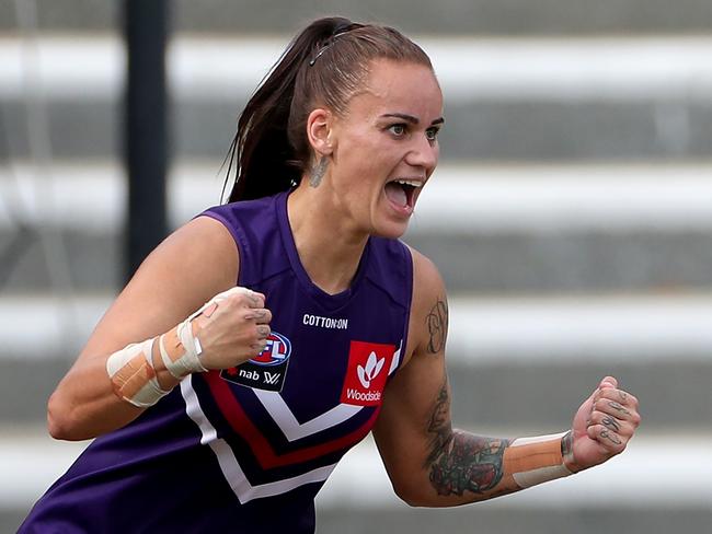 Gemma Houghton of the Dockers celebrates after kicking a goal during the AFLW semi final 4 match between the Fremantle Dockers and Gold Coast Suns at Fremantle Oval in Perth, Saturday, March 21, 2020. (AAP Image/Richard Wainwright) NO ARCHIVING, EDITORIAL USE ONLY