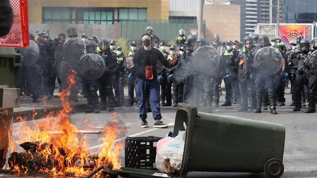 Protesters surround the Melbourne Convention centre in an attempt to close down The Land Forces 2024 International Land Defence Exposition. Picture: David Crosling