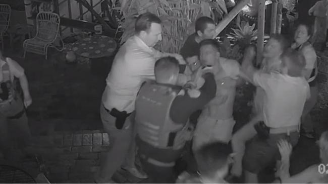 Screengrab of Tom Starling getting punched by a police officer at Shady Palms hotel in late 2020.