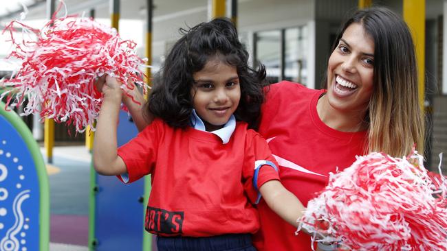 William Rose School, for children with special needs, hosted its sports day. Genevieve Grace with Kingston Perera, 6, are cheering for the Red Team.