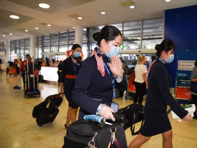 Staff arrive into Sydney on a flight from Wuhan on January 23. Picture: Flavio Brancaleone