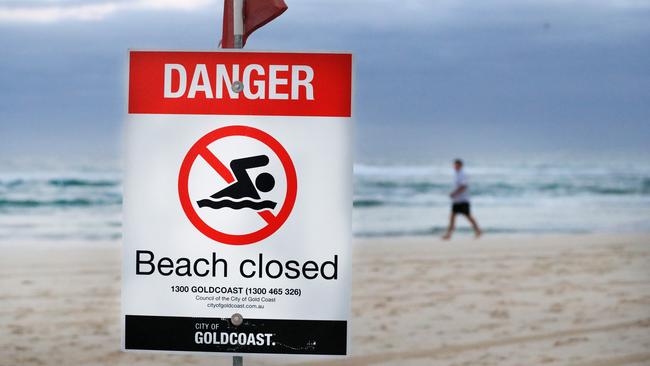 A beach closed sign at Snapper Rocks on Wednesday. Photo: Scott Powick.