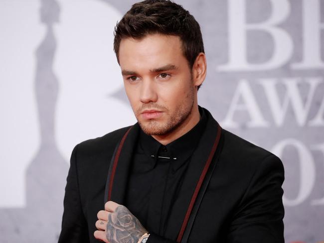 (FILES) British singer-songwriter Liam Payne poses on the red carpet on arrival for the BRIT Awards 2019 in London on February 20, 2019. British former One Direction star Liam Payne consumed cocaine, alcohol and a prescription antidepressant before falling to his death from a Buenos Aires hotel balcony, Argentine prosecutors said on November 7, 2024. (Photo by Tolga AKMEN / AFP)