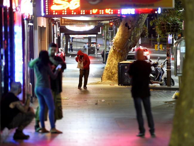 The main strip, once thronging with people, is now deserted in the early hours. Read the history of the Cross, and the forces behind its dramatic gentrification, in The Weekend Australian tomorrow. Photo Jeremy Piper