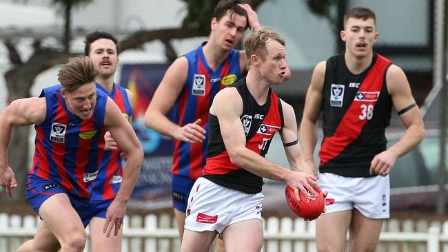 Essendon speedster Nick Hind on the charge.