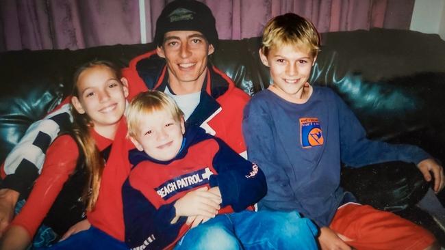 Chris Jarvis with three of his four children before he went missing. Picture: Supplied