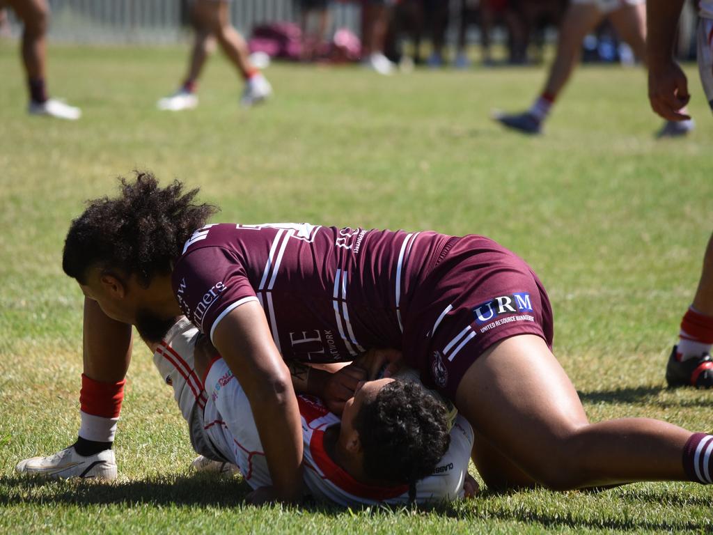 Joven Gyemore is hit by Xavier Sofeni. Picture: Sean Teuma/NewsLocal