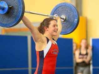 GOOD LIFT: Tori Gallegos is all smiles after a successful lift. The Glennie student recently won the the Queensland Weightlifting Association U15/17 State Championships. Picture: Monica Huddleston