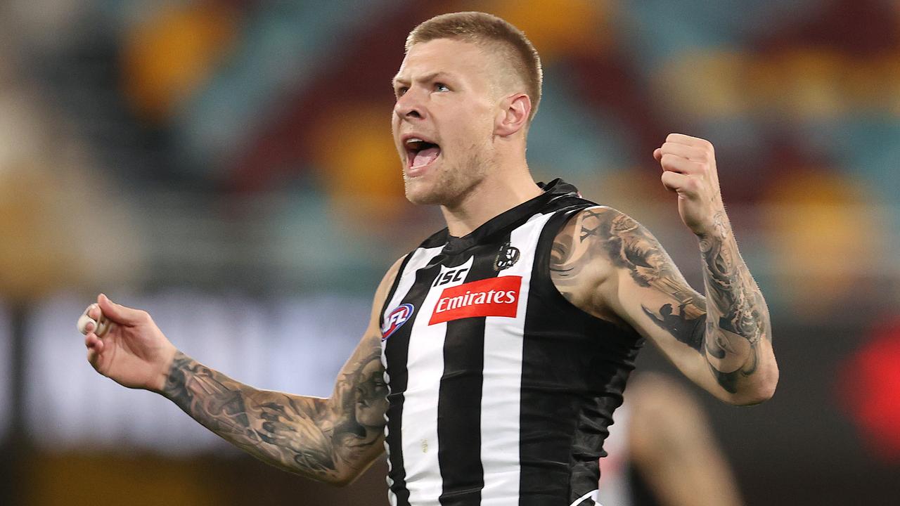 AFL Round 17. 14/09/2020. .. Collingwood vs Gold Coast Suns at the Gabba, Brisbane . Jordan De Goey of the Magpies celebrates his goal in the first quarter . Pic: Michael Klein