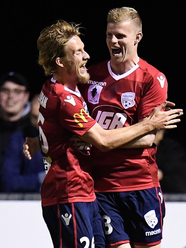 Benjamin Halloran, left, and Jordan Elsey celebrate Elsey’s goa. Picture: AAP Image/Julian Smith