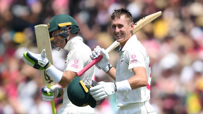 Marnus Labuschagne of Australia (right) celebrates with Tim Paine after bringing up his double century on day 2 of the third Test Match between Australia and New Zealand at the SCG in Sydney, Saturday, January 4, 2020. (AAP Image/Dan Himbrechts) NO ARCHIVING, EDITORIAL USE ONLY, IMAGES TO BE USED FOR NEWS REPORTING PURPOSES ONLY, NO COMMERCIAL USE WHATSOEVER, NO USE IN BOOKS WITHOUT PRIOR WRITTEN CONSENT FROM AAP