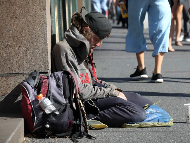 Homeless not Homeless. Police have charged 33 professional and aggressive beggars in a CBD operation during the Australian Open. Police say that most of them have houses in the suburbs and usually drive into town to beg, some with pets to attract sympathy. A beggar on Princes Bridge St Kilda Road.       Picture: David Caird