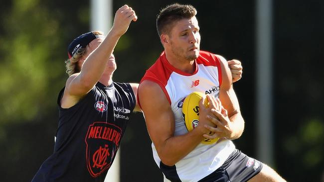 Jesse Hogan marks in front of Josh Wagner during a Demons intraclub match. (Photo by Quinn Rooney/Getty Images)