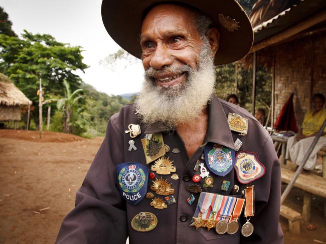 A Portrait of Australia: The best stories from 30 years of Australian Geographic. Faole Bokoi is one of only three remaining ‘Fuzzy Wuzzies’ still living along the Track. During World War II, Faole and as many as 3000 local young men ferried supplies and ammunition to the front for the Australians. The also stretchered back the wounded, a task performed with such compassion they became known as the Fuzzy Wuzzy Angels. Photo by James McCormack