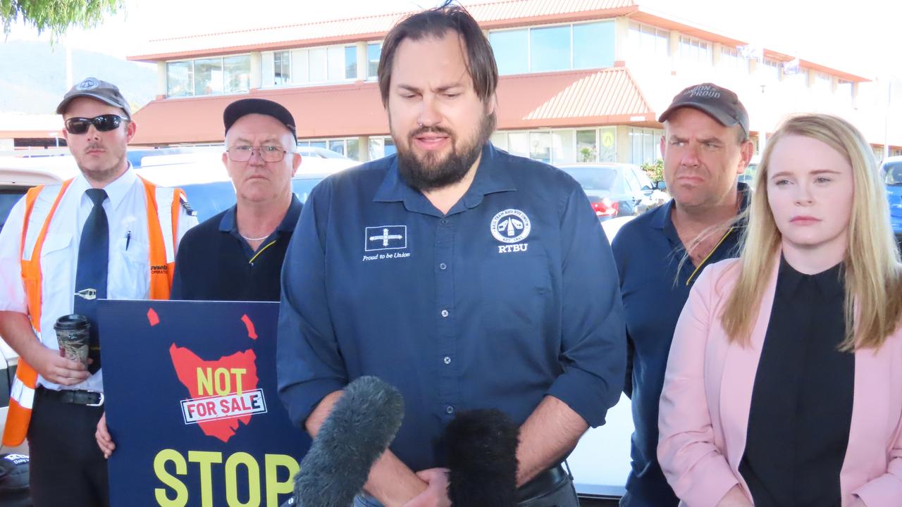 Rail, Bus and Tram Union state secretary Byron Cubit with Labor MP Meg Brown at Metro's Springfield Depot on Wednesday, March 19, 2025.