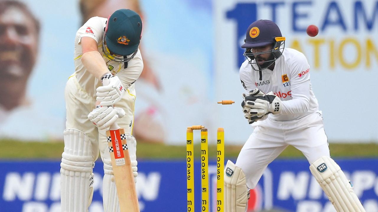 Australia's Travis Head is bowled in Galle. Picture: Ishara S. Kodikara / AFP